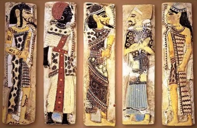 Faience tiles from the royal palace of Rameses III, depicting foreign prisoners - Libyan, Nubian, Syrian, Shasu Bedouin, & Hittite